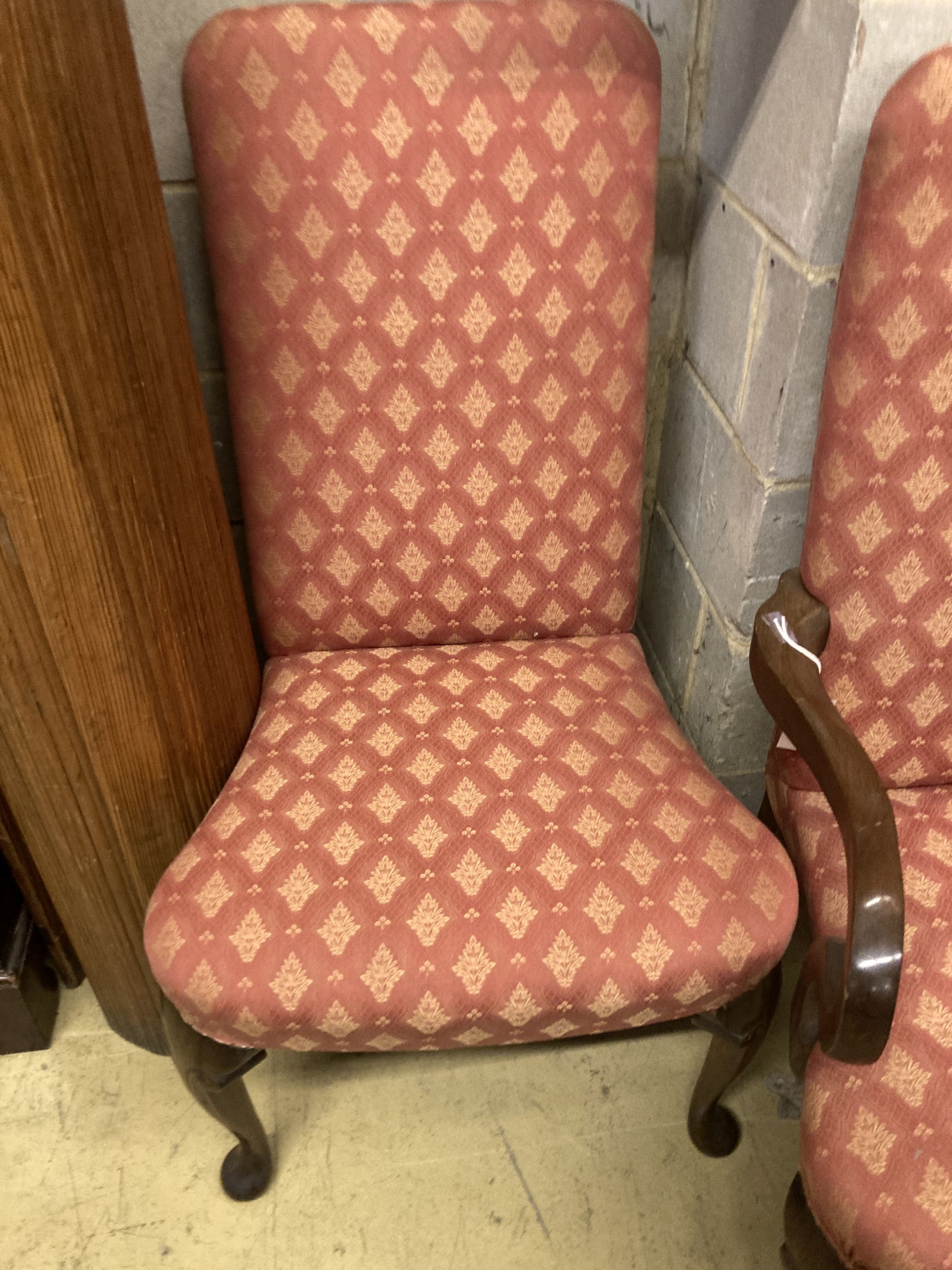 A pair of George I style upholstered mahogany dining chairs (one with arms), width 64cm depth 64cm height 110cm